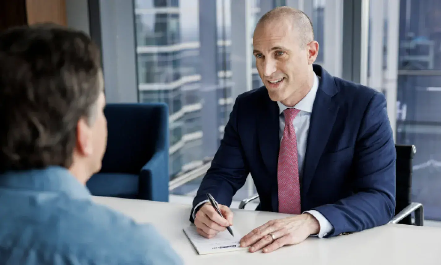 Attorney consulting with client